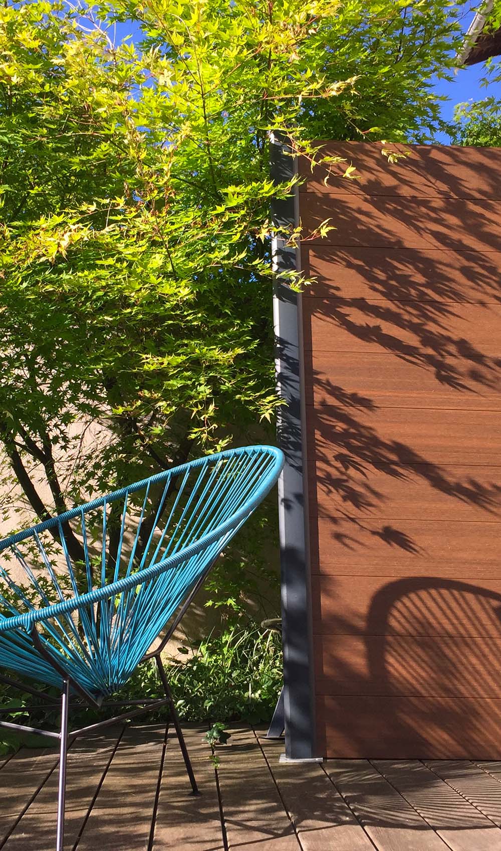 clôture composite ultraprotect neowood teinte teck avec poteau aluminium